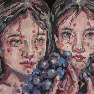 Sisters with grapes