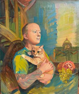 портрет молодого человека с рыжим котом